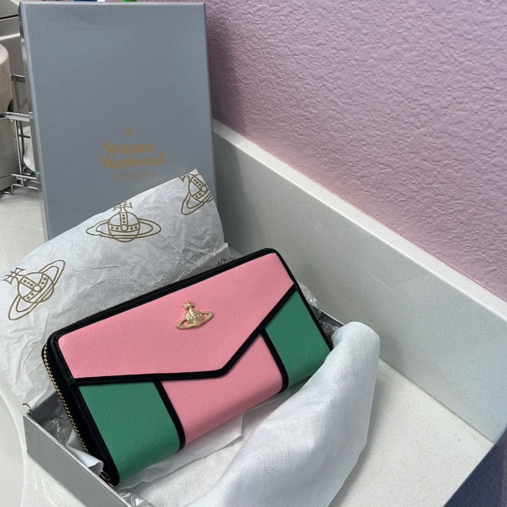 Vivienne Westwood zip wallet in box.